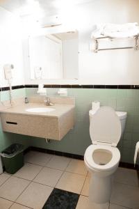 A bathroom at Bedford Motel