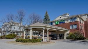 a hotel with a gazebo in front of a building at Holiday Inn Express South Burlington, an IHG Hotel in Burlington