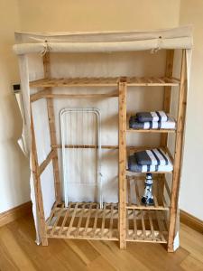a bunk bed in a room with towels on it at Oak Trees Corner stylish , relaxing , getaway in Wicklow