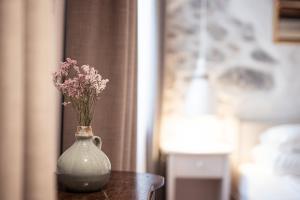 Postel nebo postele na pokoji v ubytování Boutique Hotel Zum Rosenbaum