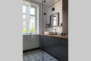 Fotografia z galérie ubytovania Apartament w kamienicy Przy Plantach v destinácii Kalisz + 12 fotografií