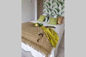 Posteľ alebo postele v izbe v ubytovaní Apartament w kamienicy Przy Plantach
