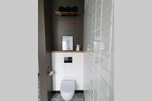 Kúpeľňa v ubytovaní Apartament w kamienicy Przy Plantach