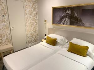 Кровать или кровати в номере Villa des Ambassadeurs