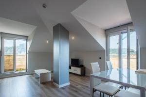TV a/nebo společenská místnost v ubytování Apartamentos La Albarca