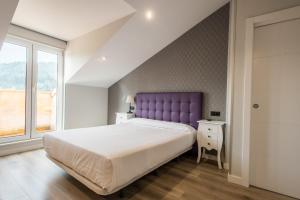 Postel nebo postele na pokoji v ubytování Apartamentos La Albarca