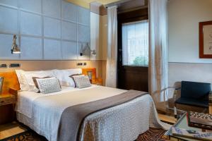 Cama ou camas em um quarto em Ca' Pisani Hotel