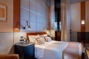 Cama ou camas em um quarto em Ca' Pisani Hotel