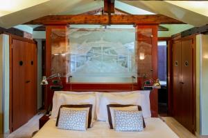 Cama ou camas em um quarto em Ca' Pisani Hotel