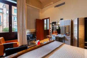 A cozinha ou cozinha compacta de Ca' Pisani Hotel