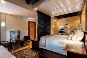 Cama ou camas em um quarto em Ca' Pisani Hotel