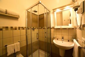 Koupelna v ubytování Hotel Oriente