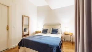 Posteľ alebo postele v izbe v ubytovaní Conde de Ibarra Suite Apartment