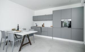 Kuchyň nebo kuchyňský kout v ubytování Apartment Figtree Vodice + 24 fotografií
