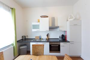 Kuchyň nebo kuchyňský kout v ubytování Oberkasseler Hof Bonn