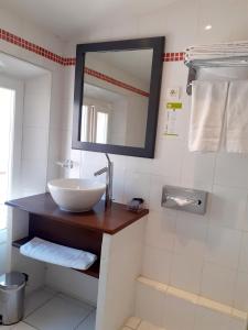 Ванна кімната в Hôtel La Villa Tosca