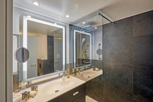 Koupelna v ubytování H4 Hotel Leipzig