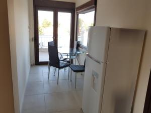 A kitchen or kitchenette at Luxury penthouse with sea view