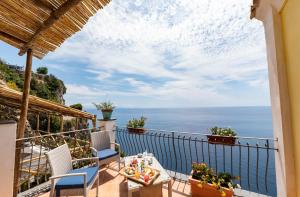 a balcony with a view of the ocean at Hotel Villa Pandora in Maiori