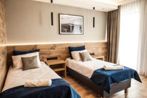Cama ou camas em um quarto em Hotel Rancho Pcim