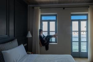 Postel nebo postele na pokoji v ubytování Elia Zampeliou Hotel