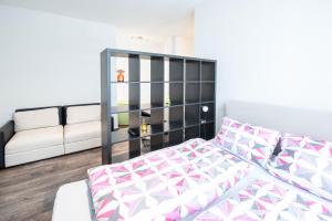 Postel nebo postele na pokoji v ubytování Central Apartments Aalen