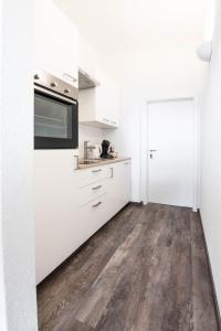 Kuchyň nebo kuchyňský kout v ubytování Central Apartments Aalen