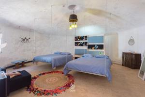Uma cama ou camas num quarto em Bagos do Vilar