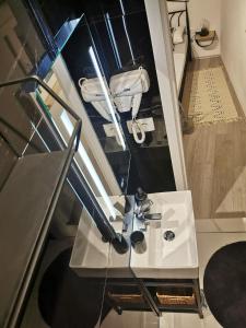 a bathroom with a white sink and a mirror at Accommodation Mala Plaža in Podaca +36 photos