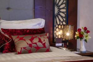 Postel nebo postele na pokoji v ubytování Palais Medina Riad Resort