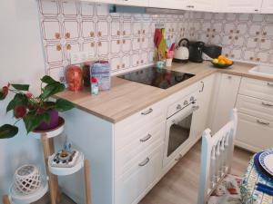 Kuchyňa alebo kuchynka v ubytovaní Lagunillas Travel Apartment BY NAMASTE ELITE