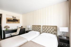 Postel nebo postele na pokoji v ubytování Amberton Hotel Klaipeda