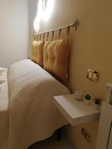 Postel nebo postele na pokoji v ubytování B&b regina del porto