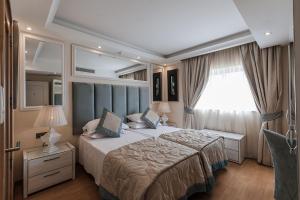 Ένα ή περισσότερα κρεβάτια σε δωμάτιο στο Osborne Hotel