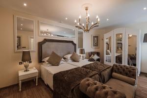 Ένα ή περισσότερα κρεβάτια σε δωμάτιο στο Osborne Hotel