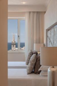 Ένα ή περισσότερα κρεβάτια σε δωμάτιο στο Osborne Hotel