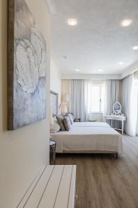Ένα ή περισσότερα κρεβάτια σε δωμάτιο στο Osborne Hotel