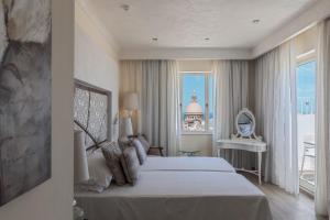 Ένα ή περισσότερα κρεβάτια σε δωμάτιο στο Osborne Hotel