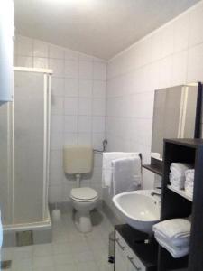 Koupelna v ubytování APARTAMENTOS AROMA