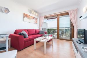 Μια τηλεόραση ή/και κέντρο ψυχαγωγίας στο Apartamento Lyna