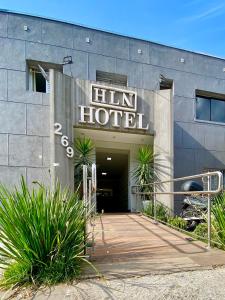 a building with a sign that reads him hotel at HLN Hotel - Expo - Anhembi in São Paulo