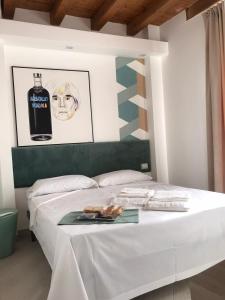 Posteľ alebo postele v izbe v ubytovaní Guest house Regina Margherita
