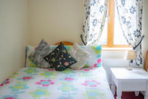 Giường trong phòng chung tại no 6 Cnoc Na Si