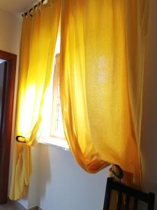 Fotografie z fotogalerie ubytování The Yellow House v destinaci Fiumicino