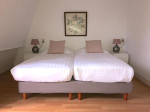 Cama o camas de una habitación en Zandvoort Centre Apartment