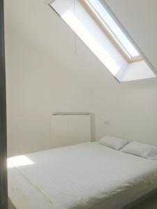 Krevet ili kreveti u jedinici u okviru objekta Guest Villa Klaipeda