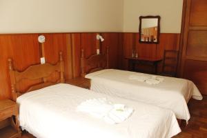 Cama ou camas em um quarto em Hotel Casa São José