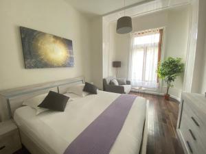 B&B Guest House Du Lac客房内的一张或多张床位