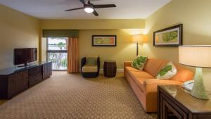 a living room with a couch and a tv at Holiday Inn Club Vacations At Orange Lake Resort, an IHG Hotel in Orlando