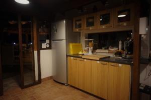 Kuchyň nebo kuchyňský kout v ubytování B&B Donna Maja